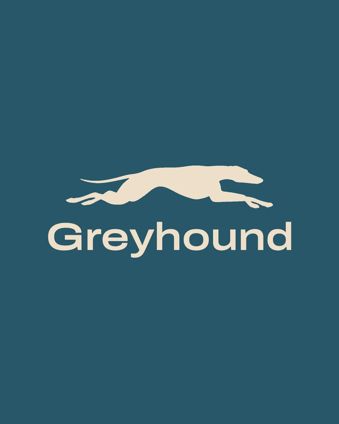 The final Greyhound 2.0 logo: a cream running greyhound above a cream Greyhound wordmark on Majestic Mountain Blue.